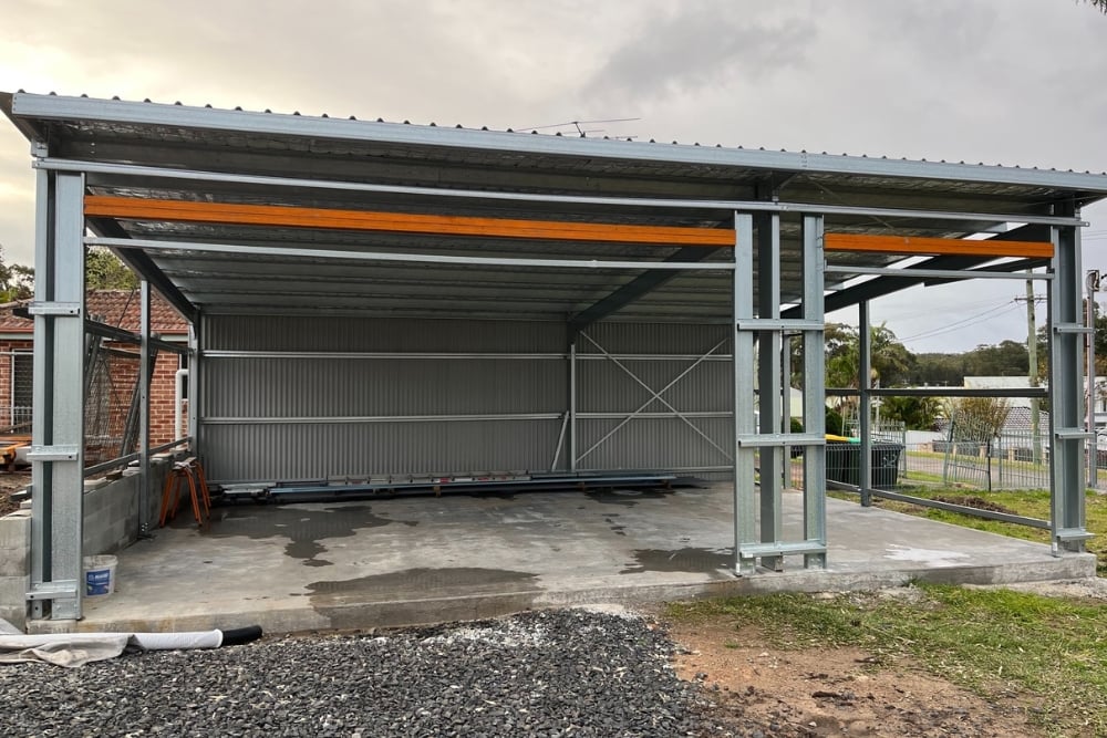New steel carport shed on concrete slab