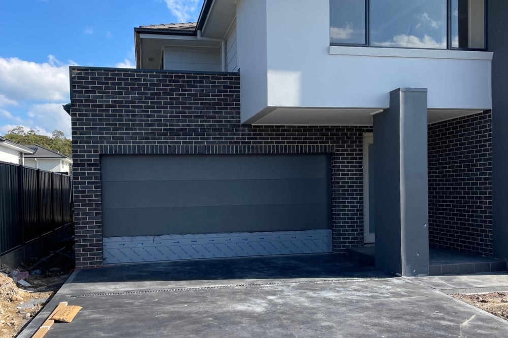 Modern two-storey brick home with double garage
