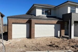 Modern two-storey brick house with double garage