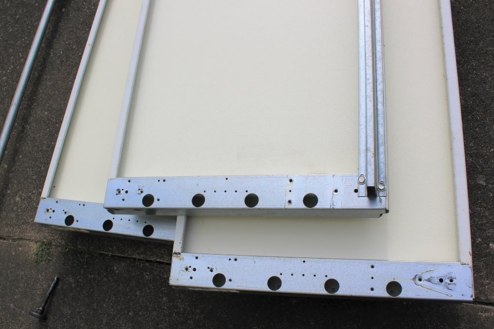 Cross-section of insulated garage door panel showing foam core