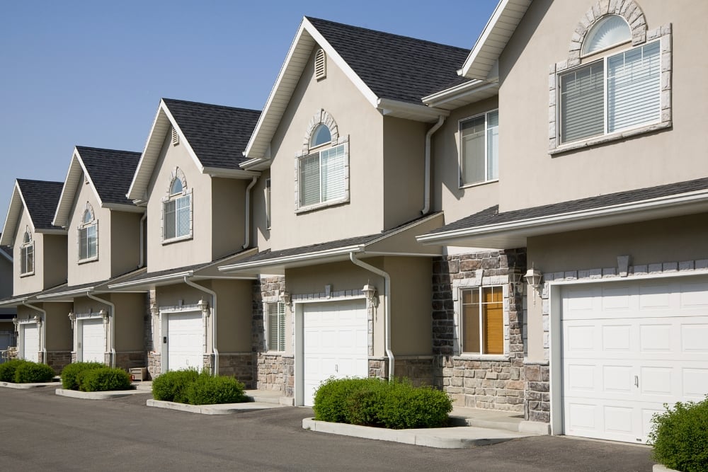 Row of modern townhouses with garages
