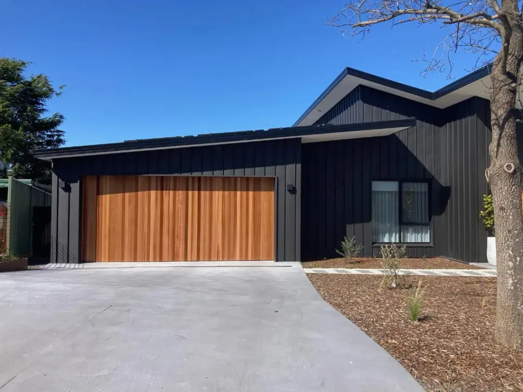 Signature custom timber garage door installed by Coast to Valley Garage Doors